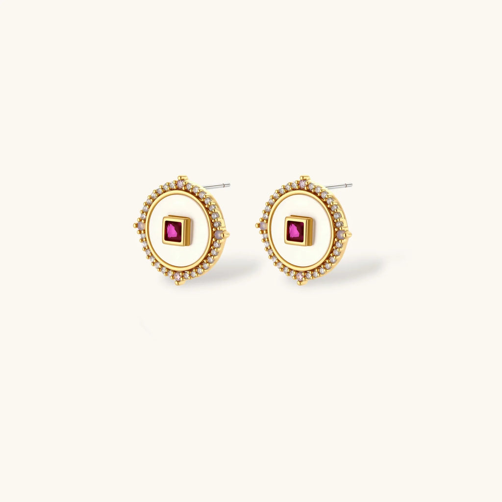 Gold-plated circular medallion necklace set with white enamel base and pink cubic zirconia accent stones