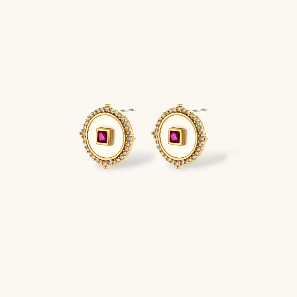 Gold-plated circular medallion necklace set with white enamel base and pink cubic zirconia accent stones