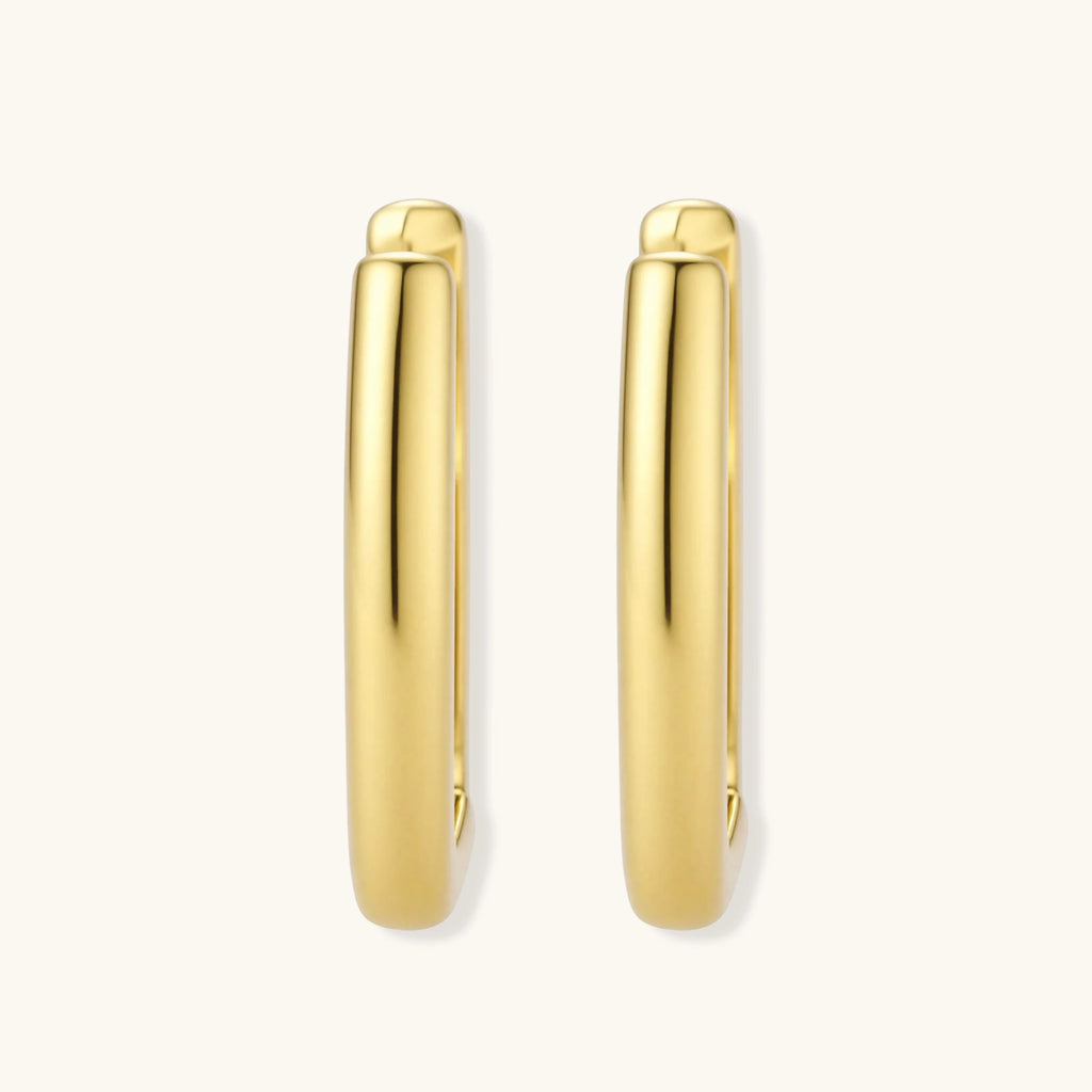 Polished gold-plated sterling silver hoop earrings with hinged closure mechanism on white background.