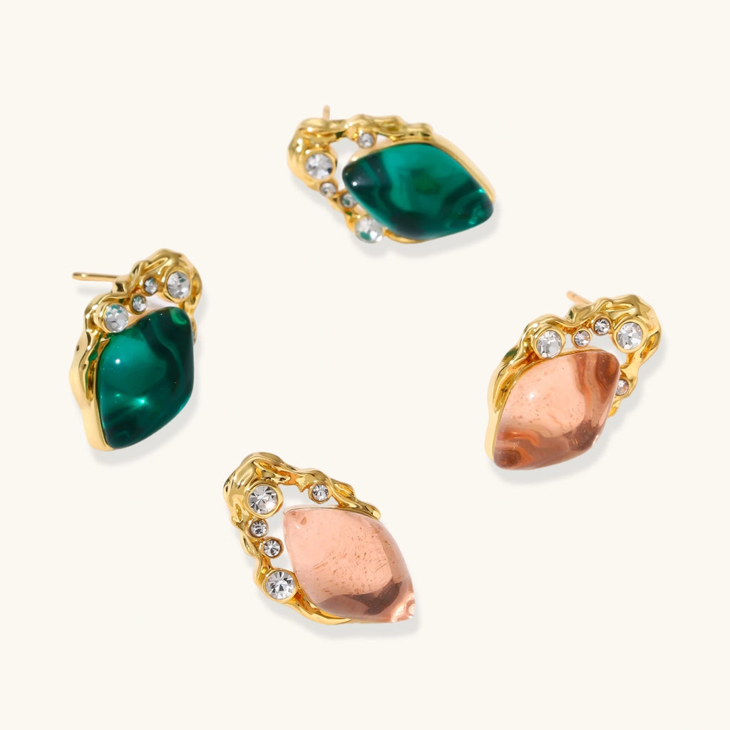 Gold-plated stud earrings featuring teardrop emerald green liuli stones with cubic zirconia crystal accents on white background.